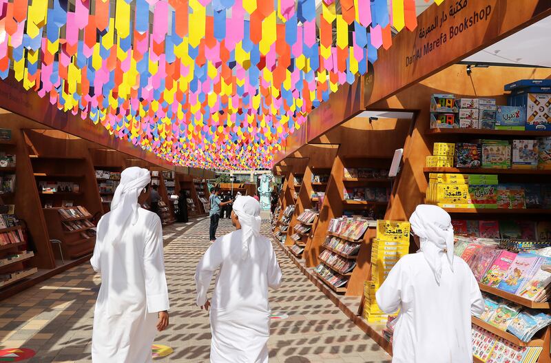 First-day visitors to the Al Ain Book Festival at Hazza bin Zayed Stadium in Al Ain. Pawan Singh / The National 