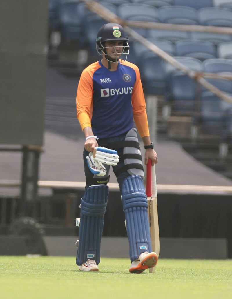 Indian batsman Shubman Gill walks out for his training session ahead of their first ODI against England in Pune. AP