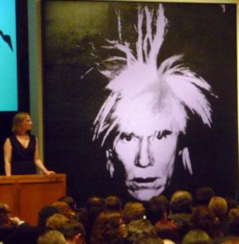 A self portrait by Andy Warhol sold at a May 12 Sotheby's auction for $32 million, an auction record for the artist.
