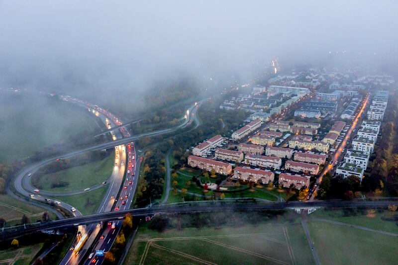 Low clouds over a residential area in Frankfurt, Germany. AP
