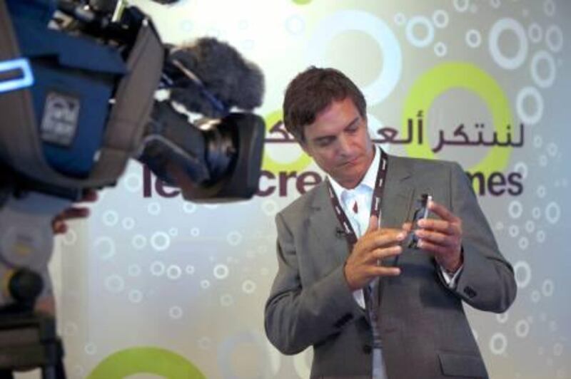 United Arab Emirates - Dubai - November 29th, 2010:  David Ashford demonstrates an iphone app at the Dubai Games Expo.  (galen Clarke/The national)