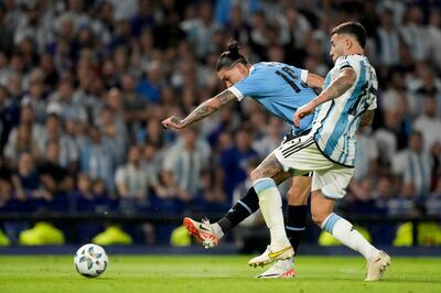 Darwin Nunez shoots to score Uruguay's second goal against Argentina. AP