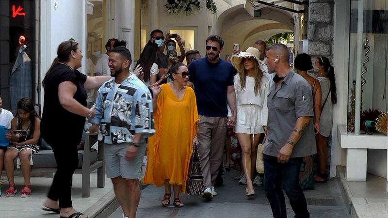 Lopez and Affleck try to walk the streets of Capri, near Naples, Italy, 2021. EPA