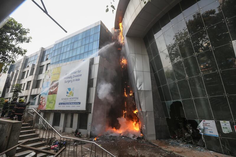 Firefighters battle a fire that broke out at a Covid-19 hospital inside a mall in Mumbai. EPA