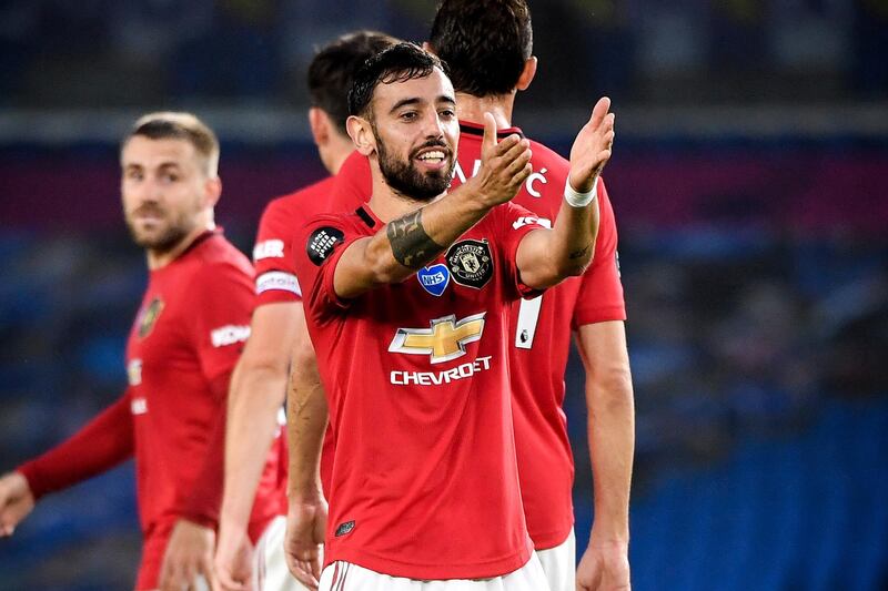 epa08518851 Manchester United's Bruno Fernandes celebrates after scoring the 2-0 lead during the English Premier League match between Brighton & Hove Albion and Manchester United in Brighton, Britain, 30 June 2020.  EPA/Andy Rain/NMC/Pool EDITORIAL USE ONLY. No use with unauthorized audio, video, data, fixture lists, club/league logos or 'live' services. Online in-match use limited to 120 images, no video emulation. No use in betting, games or single club/league/player publications.