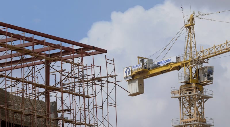 Orascom Construction is a global engineering and construction contractor primarily focused on infrastructure, industrial and high-end commercial projects in the Middle East, Africa, and the US. Dana Smillie / The National