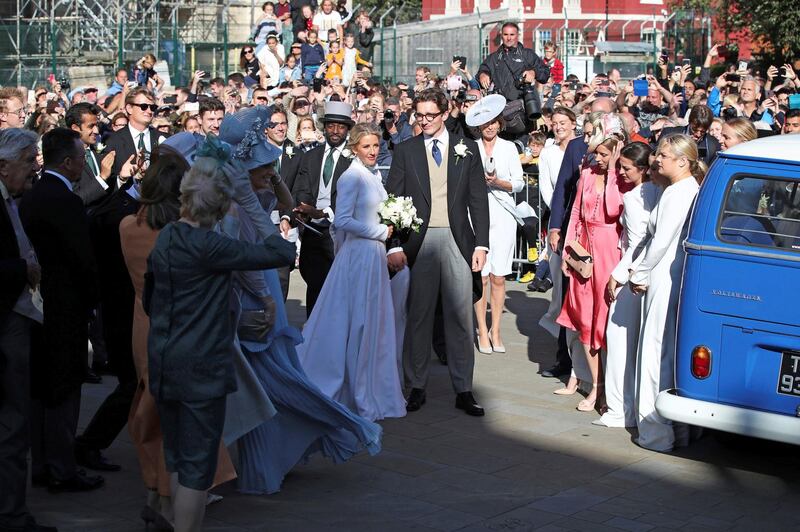 Newly married Ellie Goulding and Caspar Jopling leave York Minster after their wedding, in York, England, Saturday Aug. 31, 2019. (Danny Lawson/PA via AP)