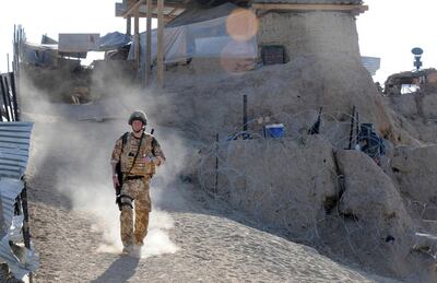 Prince Harry on patrol in the town of Garmisir in  Afghanistan in 2008. AP