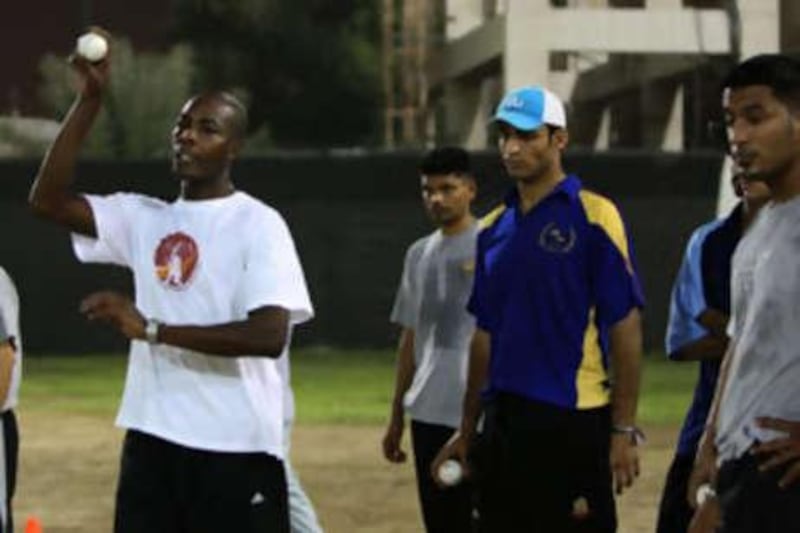 The UAE coach Vasbert Drakes takes a training session in Sharjah.