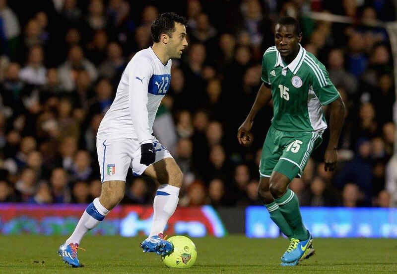 Giuseppe Rossi atempts to get around Solomon Kwambe on Monday night in Italy and Nigeria's 2-2 draw. Claudio Villa / Getty Images