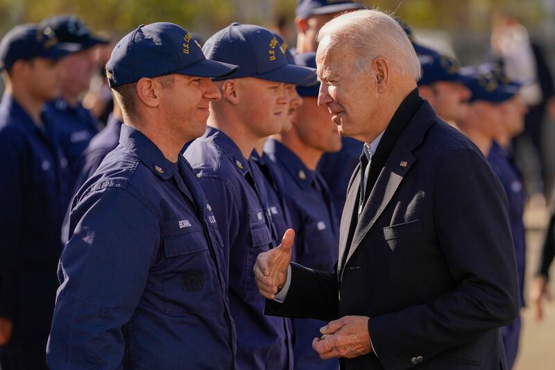President Joe Biden greets members of the US Coast Guard stationed at Brant Point in Nantucket, Massachusetts, on Thursday. AP