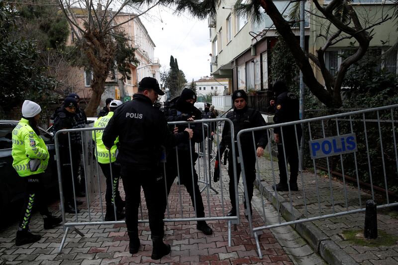 Police secure the area outside the Santa Maria Catholic church in Istanbul after an attack by two masked gunmen on Sunday. Reuters