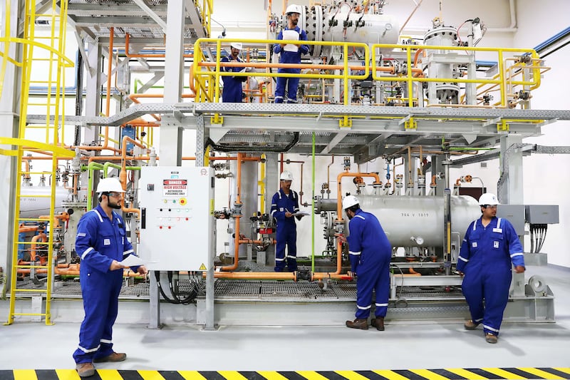 ABU DHABI , UNITED ARAB EMIRATES , NOV 7   – 2017 :- Trainees at the Gas Dehydration Unit during the opening of Adnoc Technical Academy at the Al Shawamekh area in Abu Dhabi. (Pawan Singh / The National)
