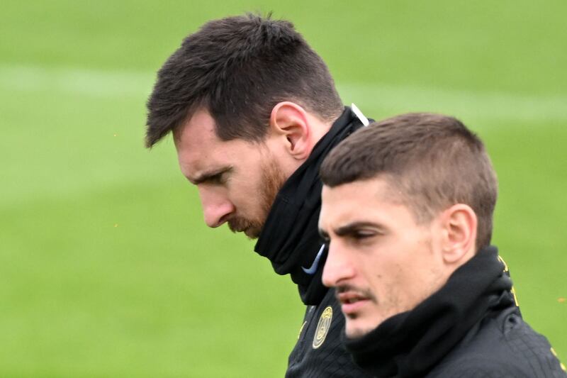 Paris Saint-Germain's Argentine forward Lionel Messi (L) and Paris Saint-Germain's Italian midfielder Marco Verratti take part in a training session at the club's "Camp des Loges" training ground in Saint-Germain-en-Laye, west of Paris on January 31, 2023.  (Photo by Bertrand GUAY  /  AFP)