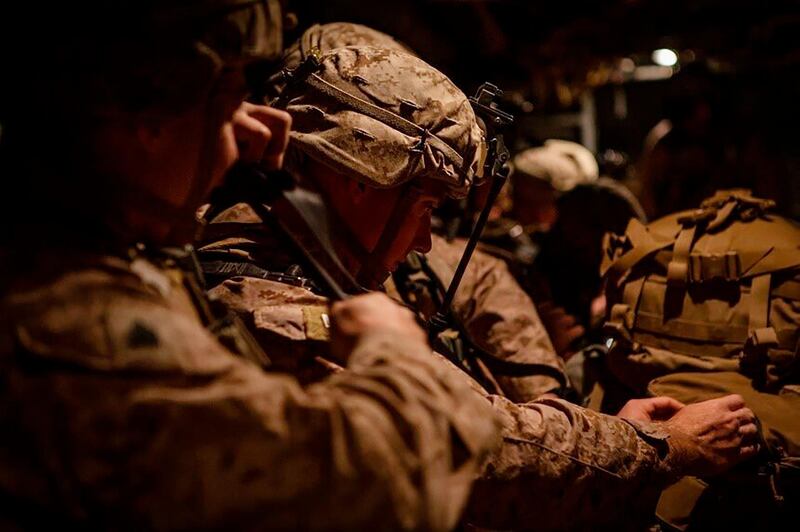 US Marines prepare to fly into Iraq from Kuwait in support of a crisis response mission. AP