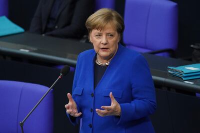 BERLIN, GERMANY - MAY 13: German Chancellor Angela Merkel answers question posed from parliamentarians during a question and answer session at the Bundestag during the coronavirus crisis on May 13, 2020 in Berlin, Germany. Germany has been easing lockdown measures over recent weeks and also plans to relax restrictions at many border crossings over coming weeks.  (Photo by Sean Gallup/Getty Images)