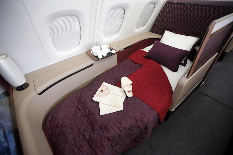 Interior view of the fully lie-flat seat converted into a bed in the first class cabin. Francois Mori / AP Photo