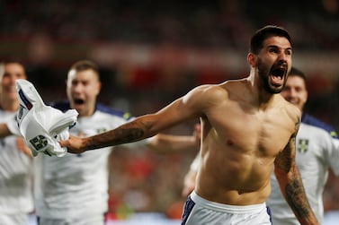 Soccer Football - World Cup - UEFA Qualifiers - Group A - Portugal v Serbia - Estadio da Luz, Lisbon, Portugal - November 14, 2021 Serbia's Aleksandar Mitrovic celebrates scoring their second goal REUTERS / Pedro Nunes     TPX IMAGES OF THE DAY