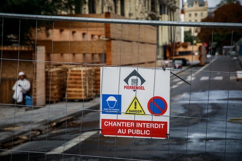 The service entrance of the construction site of the Notre-Dame Cathedral in Paris. The yard has been stopped since analyzes proving an excessive presence of lead and the risks taken by the workers three months after the Cathedral was badly damaged by a huge fire last April. EPA