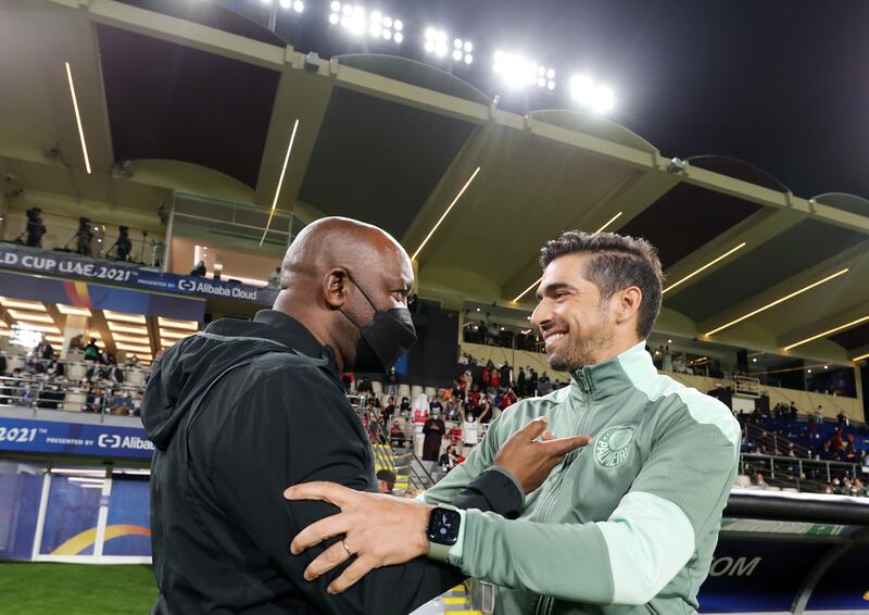 Al Ahly manager Pitso Mosimane with his Palmeiras counterpart Abel Ferreira before the game.
