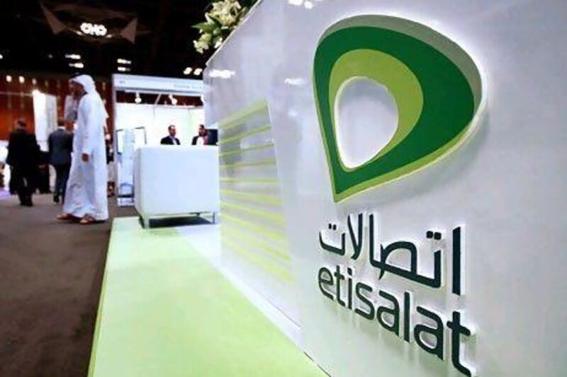 Etisalat reported yesterday its net income for the second quarter was Dh1.59 billion,nearly 15 per cent lower from Dh1.87bn in the same period last year. Pawan Singh / The National