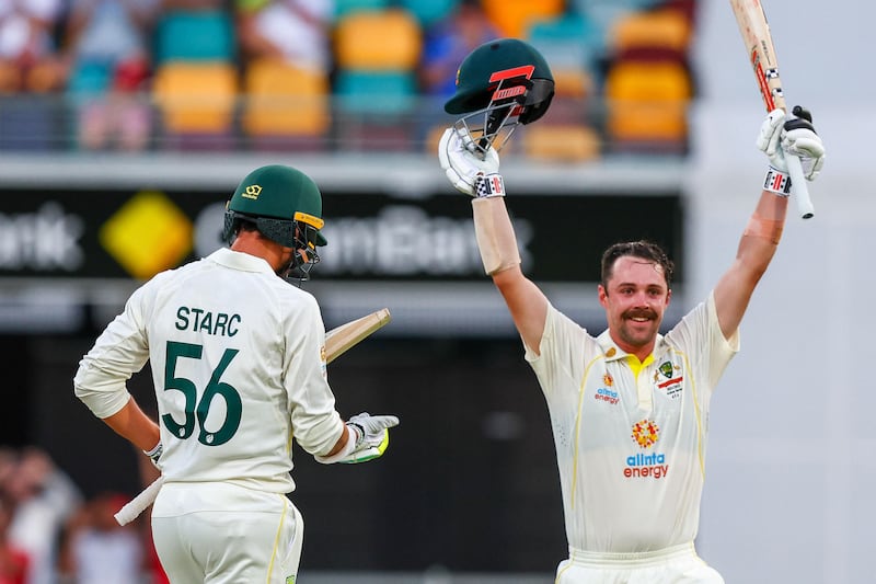 Australia's Travis Head celebrates his century during day two of the first Ashes Test against England at the Gabba in Brisbane on December 9, 2021. AFP