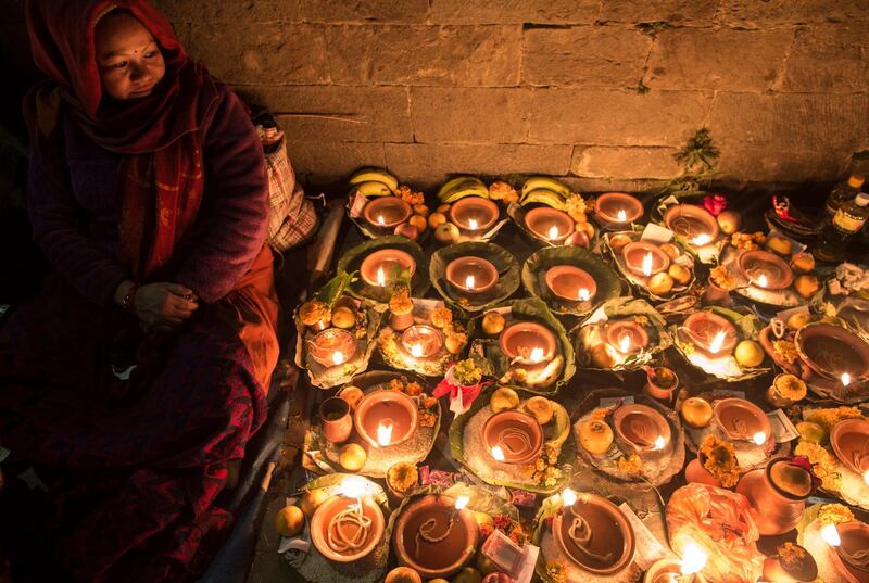 Thousands of people from all over the country have gathered at the Pasupati temple to light the oil lamps at the Bagmati river. EPA