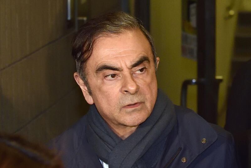 (FILES) This file photo taken on April 3, 2019 shows former Nissan Chairman Carlos Ghosn leaving the office of his lawyer Junichiro Hironaka in Tokyo. Former Nissan chief Carlos, who was on bail in Tokyo awaiting trial on financial misconduct charges, has arrived in Beirut, Lebanese official and security sources said on December 30, 2019. / AFP / Kazuhiro NOGI
