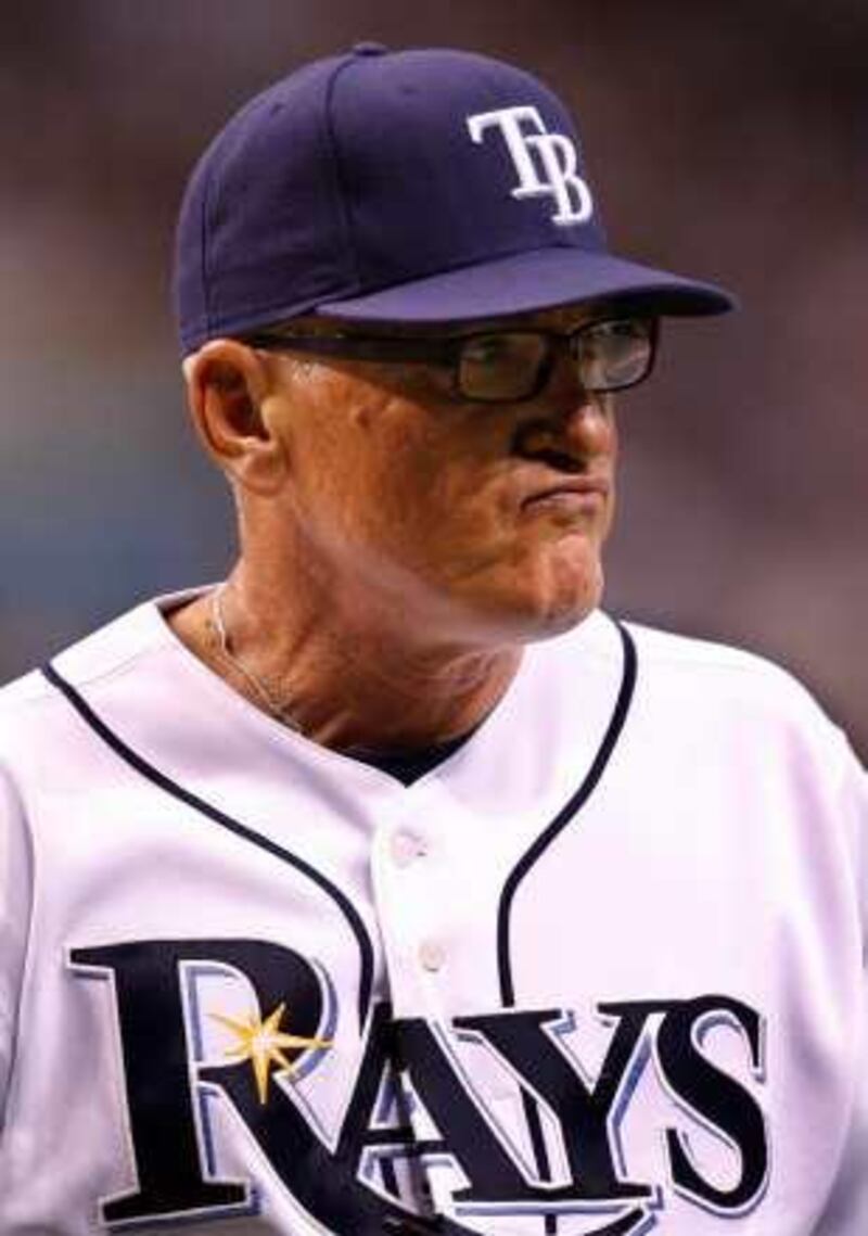 Tampa Bay Rays manager Joe Maddon walks back to the dugout after relieving pitcher Grant Balfour in the eighth inning of Game 1 of the baseball World Series against Philadelphia Phillies in St. Petersburg, Fla., Wednesday, Oct. 22, 2008. (AP Photo/Chris O'Meara)  *** Local Caption ***  WS164_World_Series_Phillies_Rays_Baseball.jpg