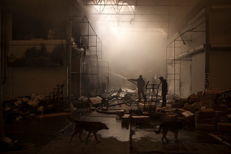 A market on fire in Kharkiv after a Russian attack. AP