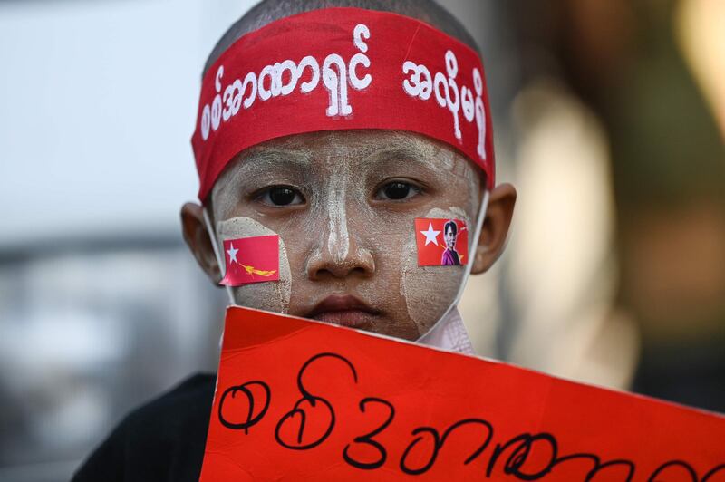 A young protester looks on during a demonstration against the military coup in Yangon. AFP