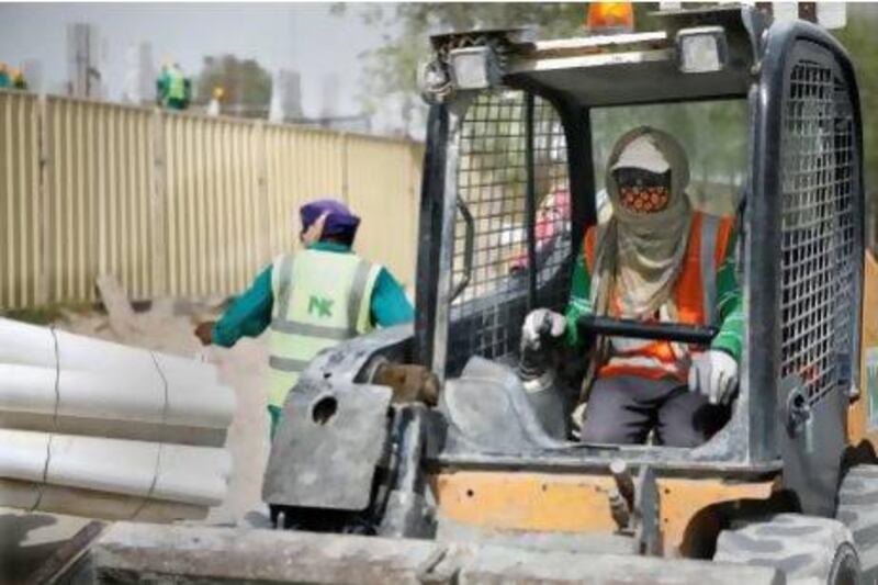 Construction workers say working in Ramadan is a challenge due to the extreme heat. Asmaa Al Hameli / The National