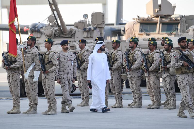 A handout image provided by the UAE Ministry of Presidential Affairs on February 9, 2020, shows Sheikh Mohamed bin Rashid al-Maktoum, Vice President and Prime Minister of the United Arab Emirates , and ruler of the Emirate of Dubai, walking past military personnel during a reception to celebrate members of the UAE Armed Forces who served in the Arab coalition in Yemen, at Zayed Military City in Abu Dhabi. (Photo by - / Ministry of Presidential Affairs / AFP) / RESTRICTED TO EDITORIAL USE - MANDATORY CREDIT "AFP PHOTO / MINISTRY OF PRESIDENTIAL AFFAIRS-UAE" - NO MARKETING - NO ADVERTISING CAMPAIGNS - DISTRIBUTED AS A SERVICE TO CLIENTS