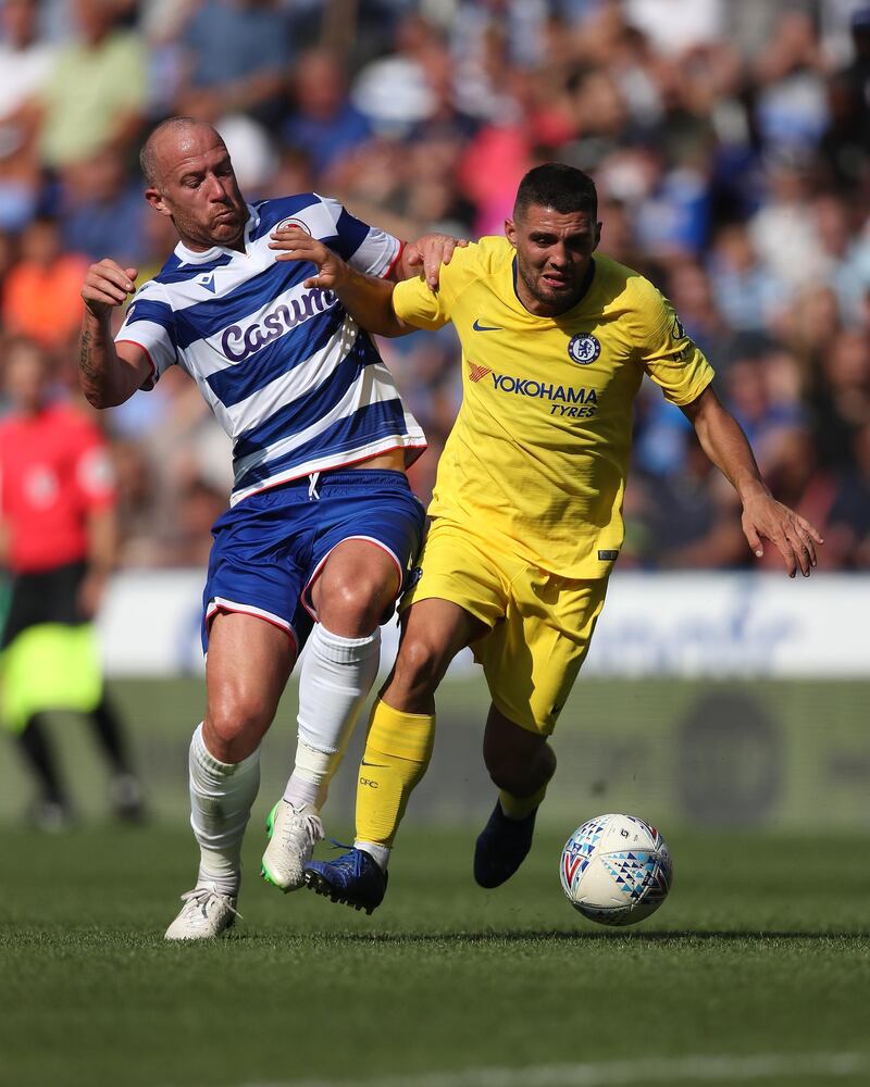 Mateo Kovacic of Chelsea battles with Charlie Adam of Reading. Getty