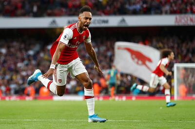 LONDON, ENGLAND - SEPTEMBER 22: Pierre-Emerick Aubameyang of Arsenal celebrates scoring his team's third goal during the Premier League match between Arsenal FC and Aston Villa at Emirates Stadium on September 22, 2019 in London, United Kingdom. (Photo by Michael Steele/Getty Images)