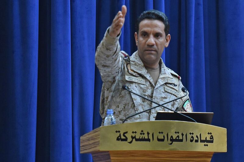 Spokesman of the Saudi-led military coalition Colonel Turki al-Maliki gestures during a press conference in the Saudi capital Riyadh, on September 16, 2019. The weapons used to strike two Saudi oil plants were provided by the kingdom's arch-foe Iran, the spokesman of the Riyadh-led coalition fighting in Yemen said. The Tehran-backed Huthi rebels in Yemen, where a coalition is bogged down in a five-year war, claimed the September 14 strikes on two facilities in Saudi Arabia, owned by state energy giant Aramco, which sent shock waves across oil markets. / AFP / Fayez Nureldine
