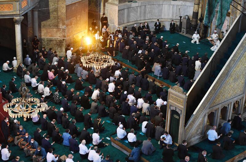 The Turkish president estimated that about 350,000 worshippers converged on the mosque for the occasion. Turkish Presidential Service / AFP