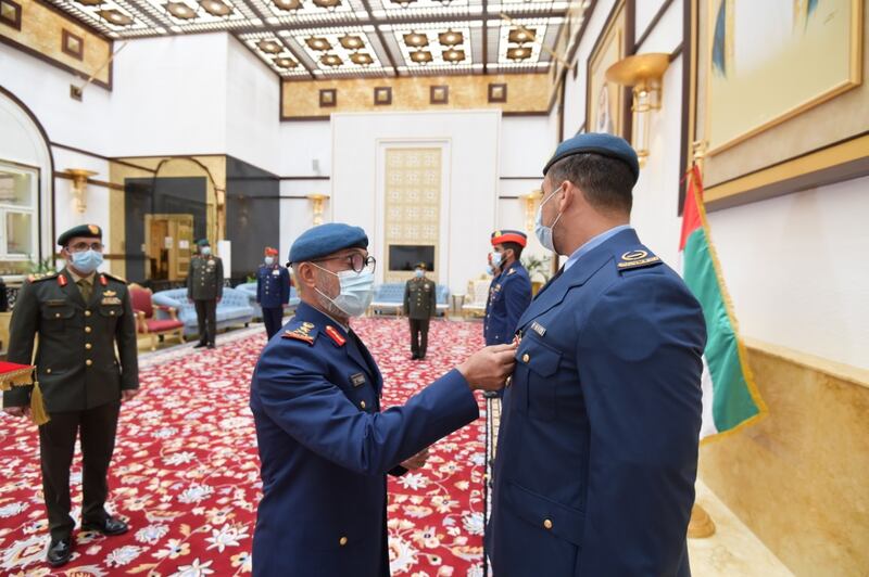 Lt Gen Issa Al Mazrouei, Deputy Chief of Staff of the Armed Forces, honours military personnel for helping Emirati diplomats leave Afghanistan. Wam