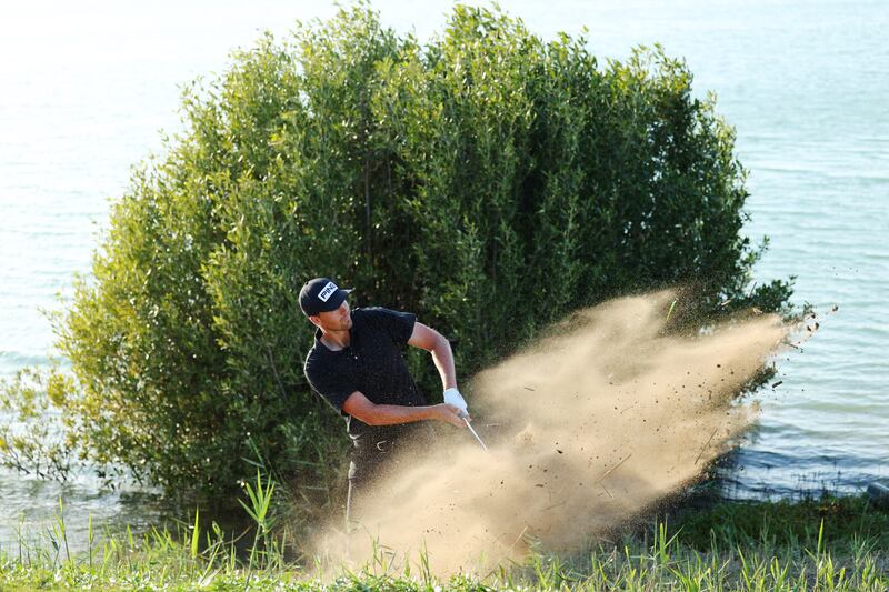 Victor Perez plays his third shot on the 18th hole at Yas Links. Getty