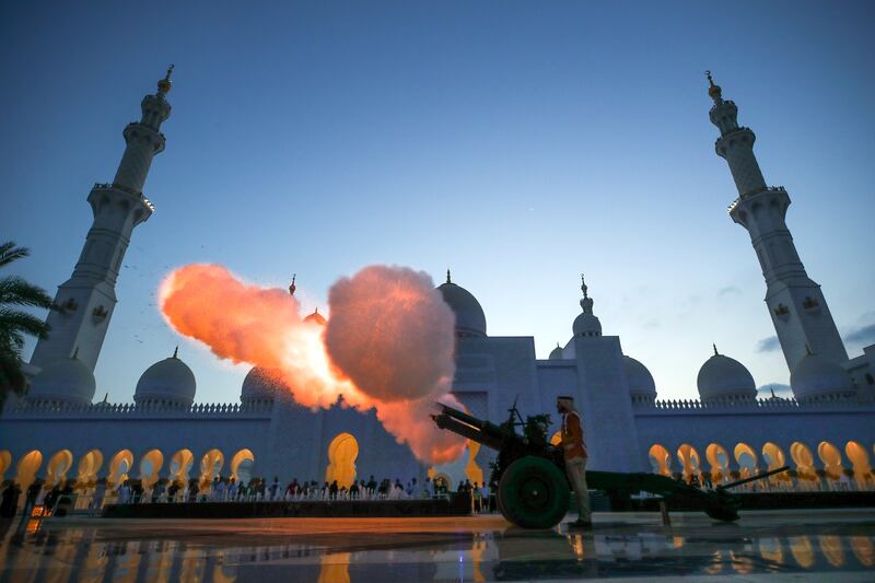 An iftar cannon is fired at the Sheikh Zayed Grand Mosque in Abu Dhabi on the first Friday of Ramadan. Victor Besa / The National