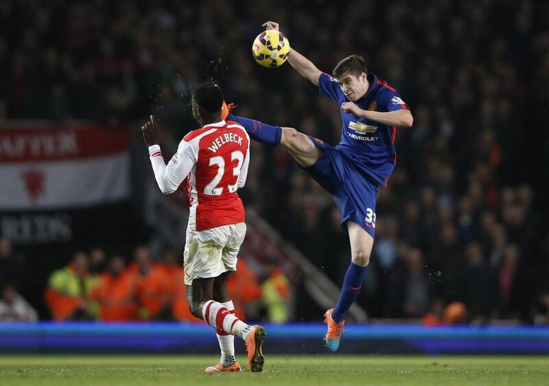 Paddy McNair shown in action with Manchester United during a Premier League match against Arsenal in November. Adrian Dennis / AFP / November 22, 2014