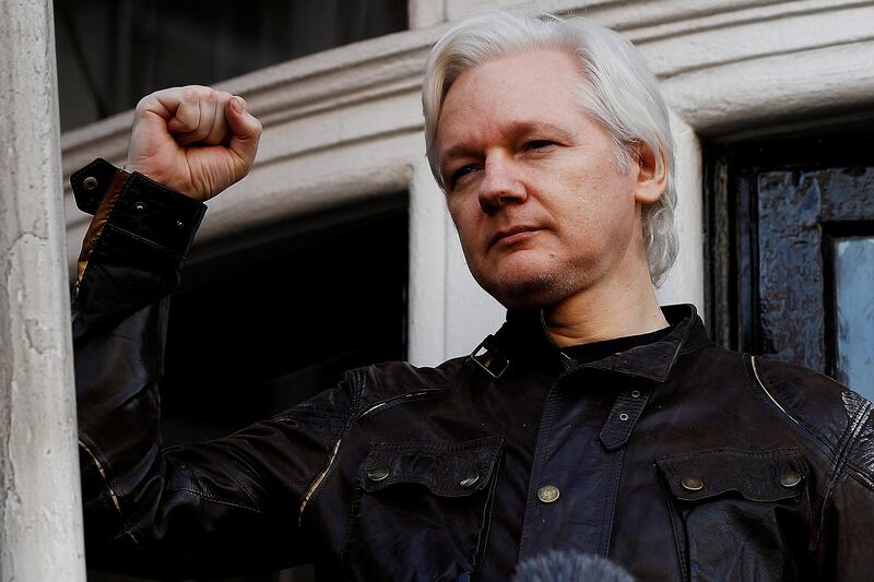 FILE PHOTO: WikiLeaks founder Julian Assange is seen on the balcony of the Ecuadorian Embassy in London, Britain, May 19, 2017. REUTERS/Peter Nicholls/File Photo