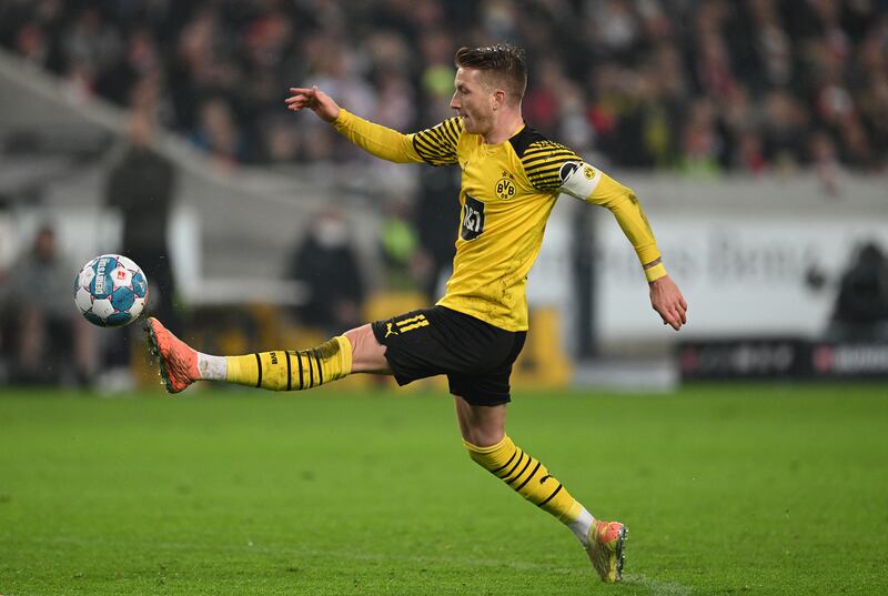 =3) Marco Reus (Borussia Dortmund) 12 assists in 29 games. 
Getty