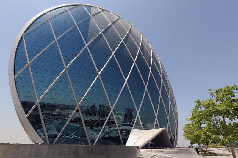 Aldar's HQ building in Abu Dhabi. The company had a market capitalisation of Dh27.36bn at close on Monday. Delores Johnson / The National