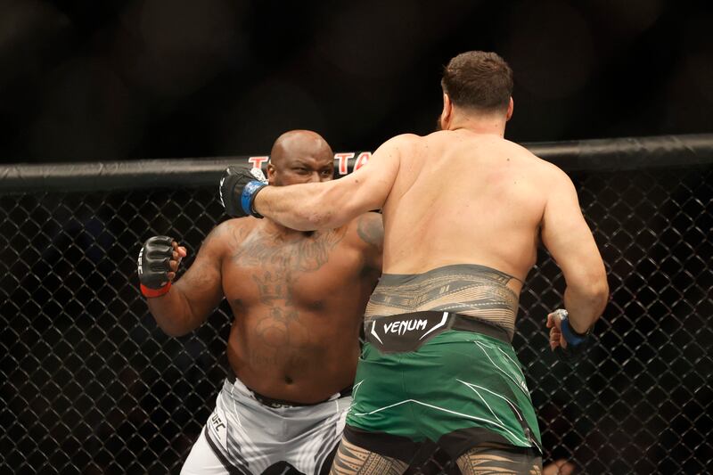  Tai Tuivasa throws a punch at Derrick Lewis during their fight at UFC 271. USA Today