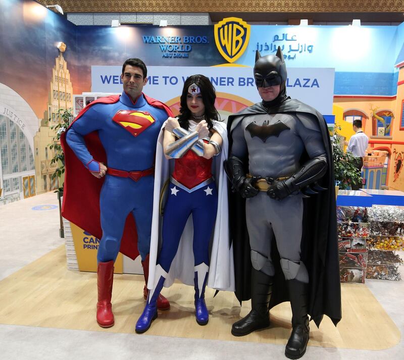 Cosplayers dressed as Superman, Wonder Woman and Batman.