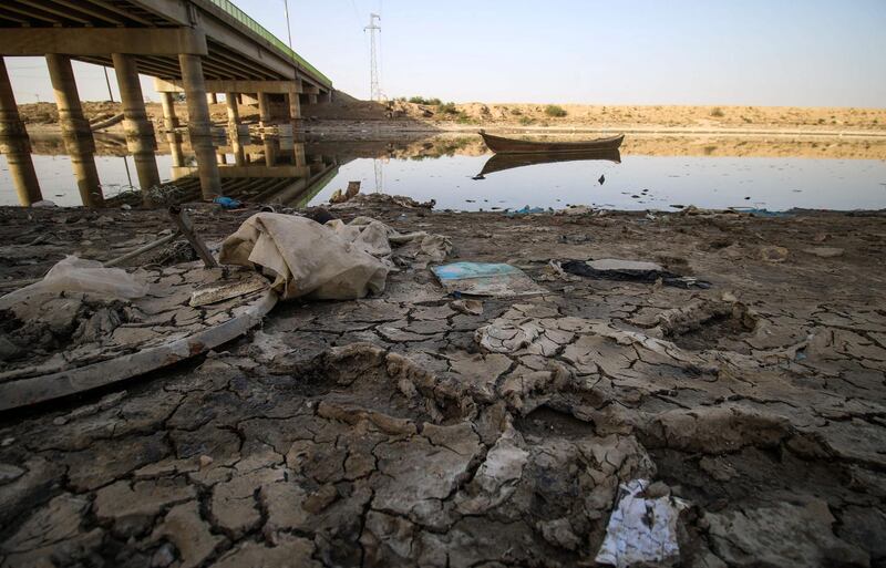 A view of the dried-up shore of an irrigation canal near the village of Sayyed Dakhil. Haidar Mohammed Ali / AFP