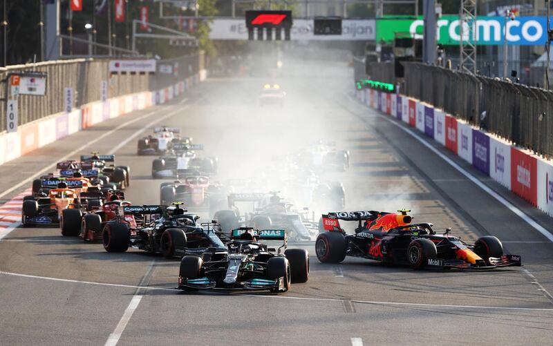 Mercedes driver Lewis Hamilton heads off the track after locking-up following the late restart. Getty