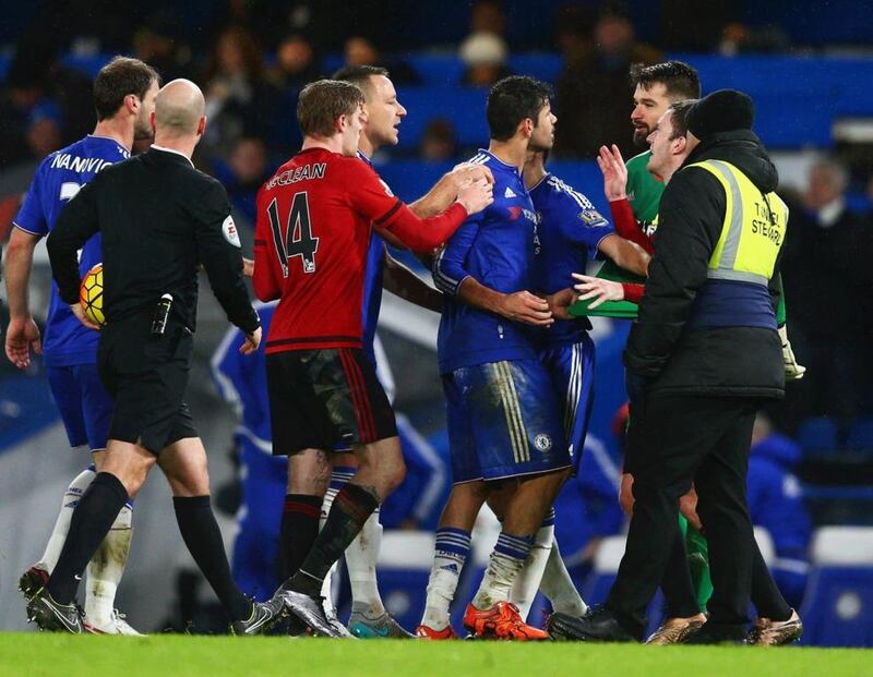 Diego Costa squares off with Boaz Myhill after the final whistle of their Premier League game at Stamford Bridge on Wednesday. Clive Mason / Getty Images