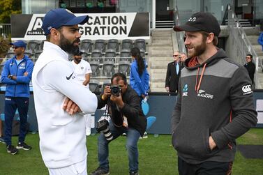 New Zealand captain Kane Williamson talks to India captain Virat Kohli. AFP 